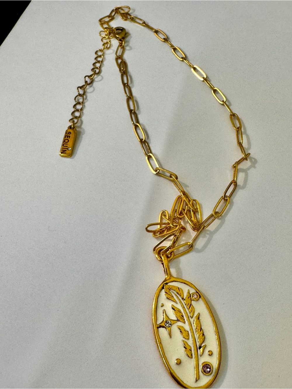 Gold-Tone Pendant Necklace with White Enamel & Pink Accent